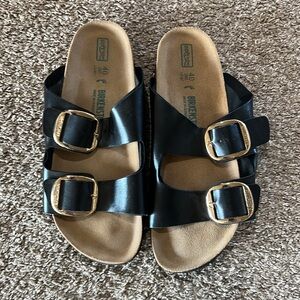 Birkenstock Black Sandals with Gold Accents